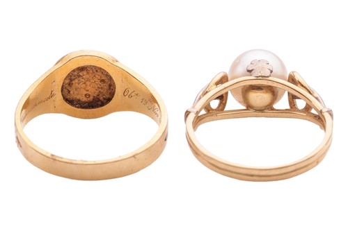Lot 6 - A mourning ring and a cultured pearl ring; the...