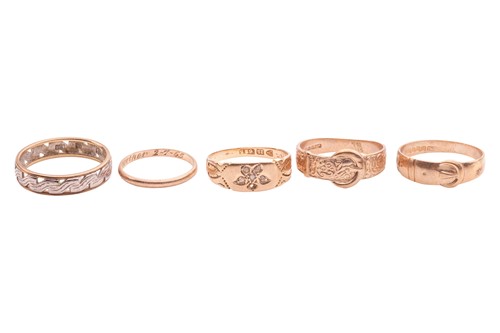 Lot 21 - A group of five rings; the first an engraved...