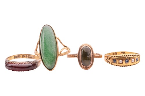 Lot 18 - A collection of four gem-set rings; one set...