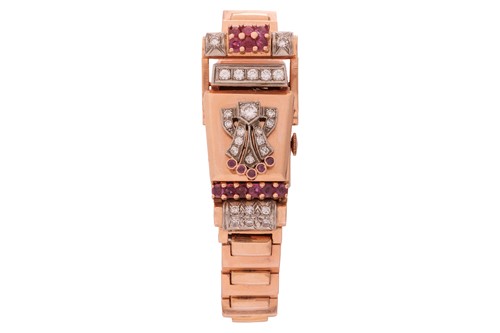 Lot 249 - A diamond and ruby-set concealed cocktail...
