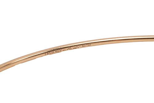 Lot 125 - Tiffany & Co. - a diamond hoop bangle by Elsa...