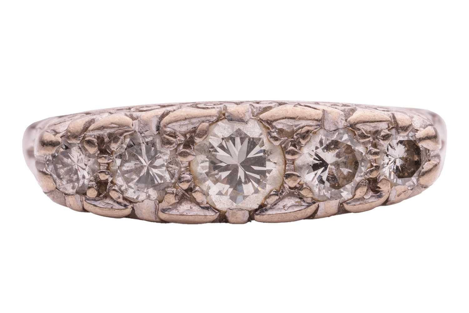 Lot 124 - A diamond half-hoop ring, with an estimated...