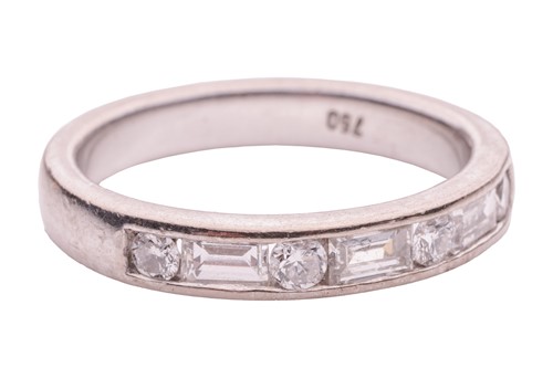 Lot 109 - A diamond half-eternity ring, with an...
