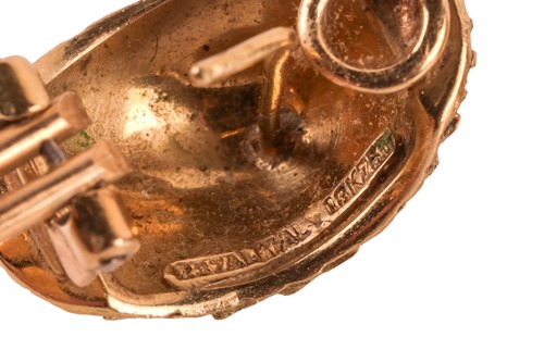 Lot 74 - A pair of textured earrings, of elongated...