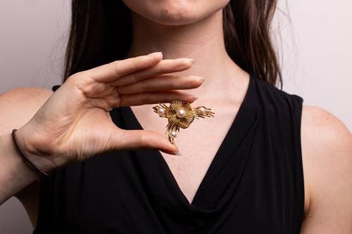 Lot 39 - A brooch of floral design set with cultured...