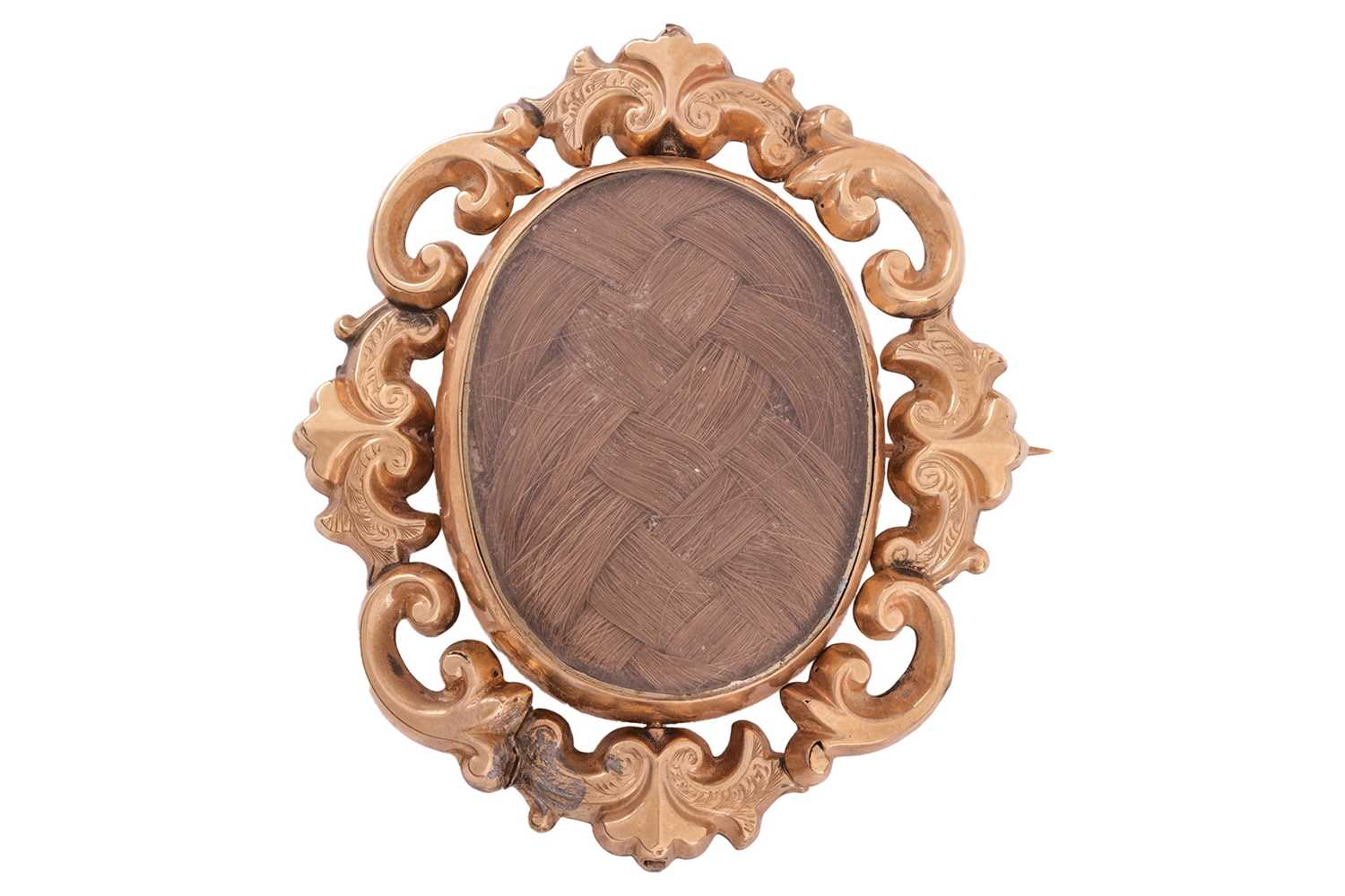 Lot 92 - A Victorian hairwork mourning brooch, of oval...