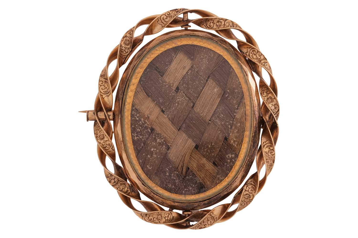Lot 95 - A Victorian hairwork mourning brooch, of oval...