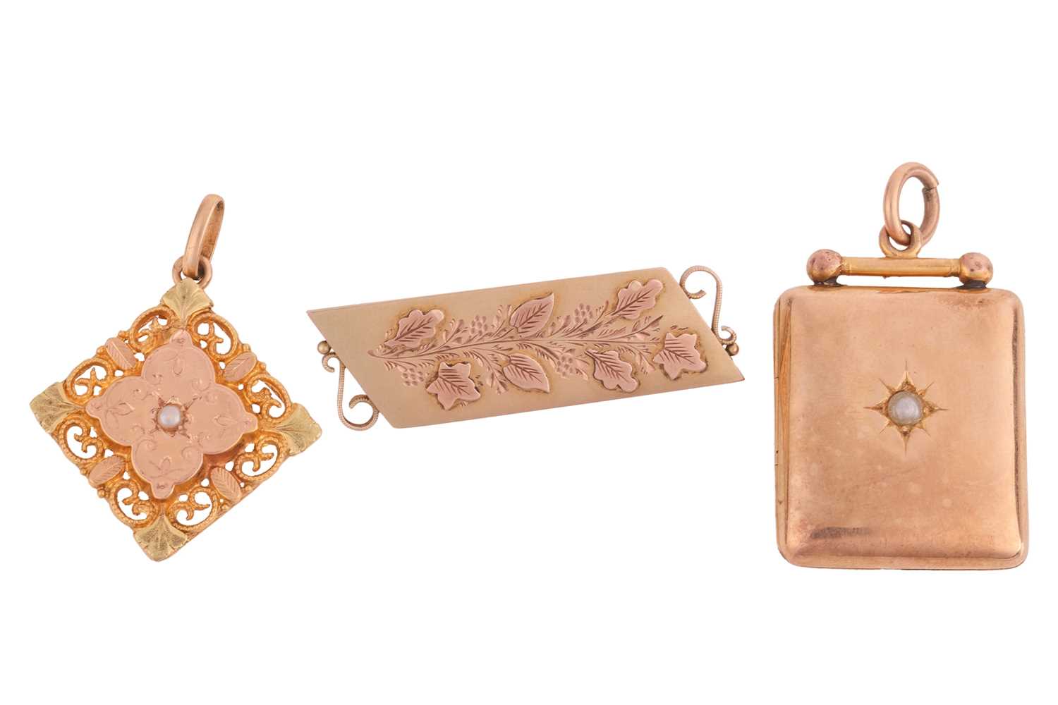 Lot 29 - A locket, a pendant and a brooch; the polished...