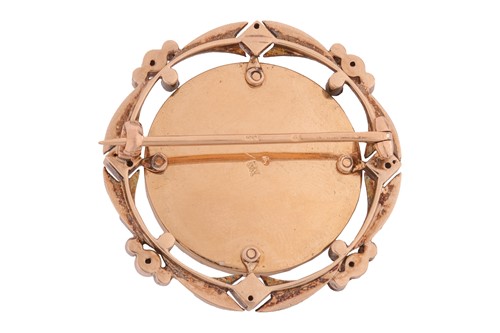 Lot 42 - A gem-set brooch, the onyx circular plaque...