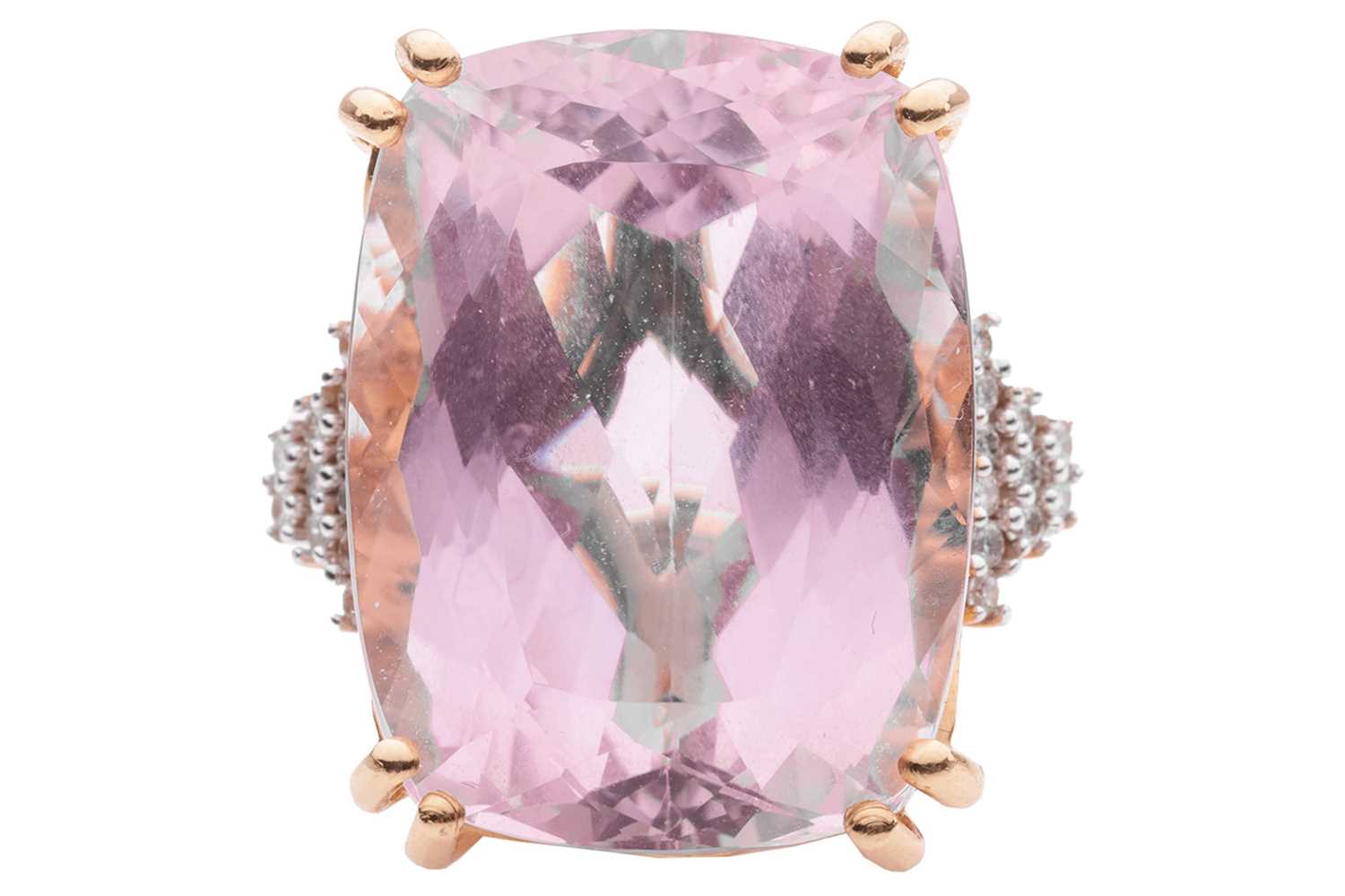 Lot 55 - A kunzite and diamond cocktail ring in 18ct...