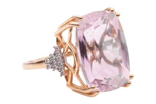 Lot 55 - A kunzite and diamond cocktail ring in 18ct...