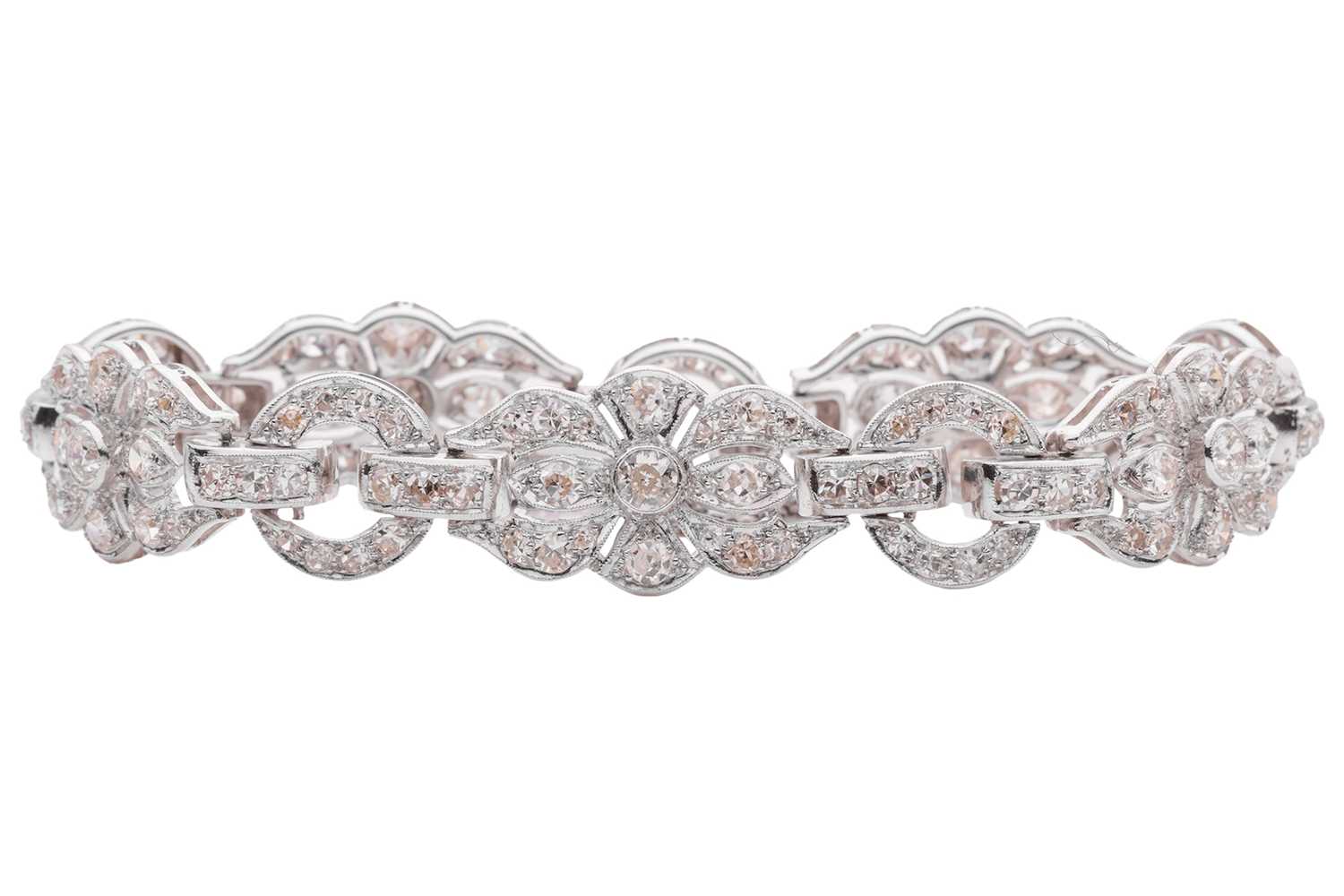 Lot 228 - A Late Art Deco diamond-set link bracelet,...