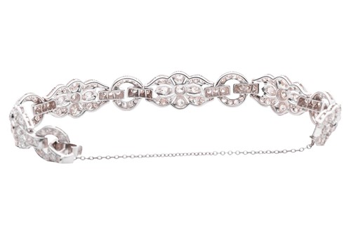 Lot 228 - A Late Art Deco diamond-set link bracelet,...