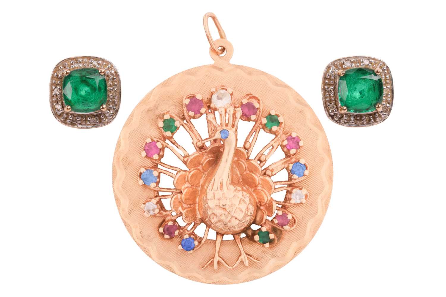 Lot 24 - A peacock pendant and a pair of synthetic...