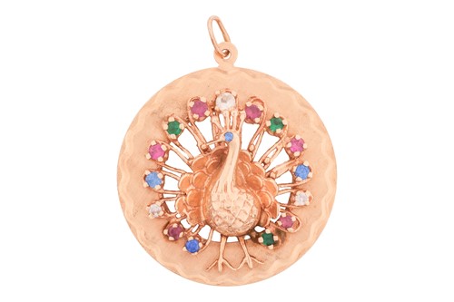 Lot 24 - A peacock pendant and a pair of synthetic...