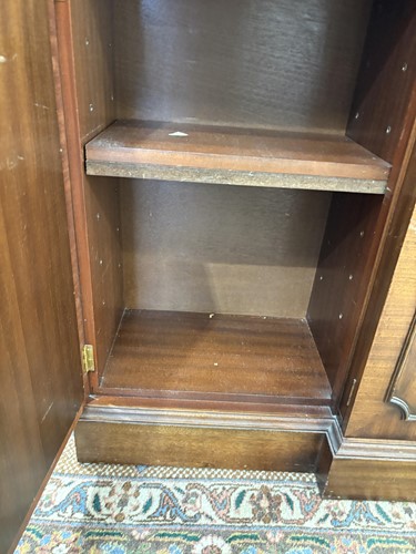 Lot 93 - A Regency style mahogany breakfront...