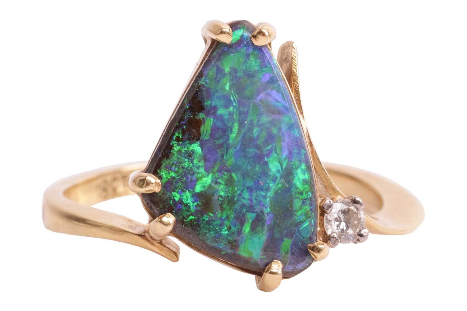 Lot 21 - A boulder opal dress ring, claw-set with a...