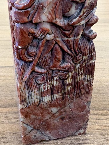 Lot 60 - A Chinese carved grey/green jade disk amulet...