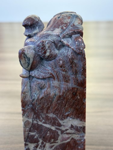 Lot 60 - A Chinese carved grey/green jade disk amulet...