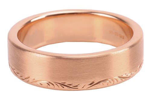 Lot 40 - A brush-finished ring band in 18ct gold, with...
