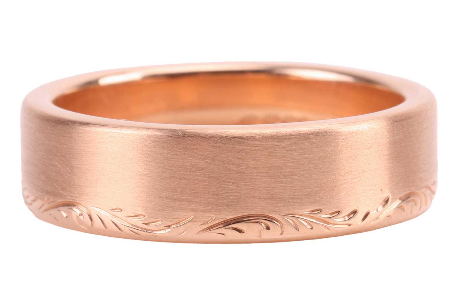Lot 40 - A brush-finished ring band in 18ct gold, with...