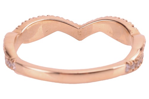Lot 23 - A diamond-set ring in 18ct gold, comprising a...