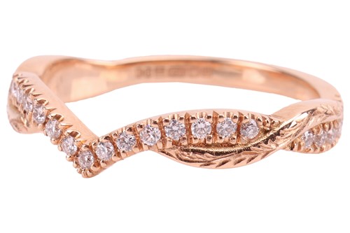 Lot 23 - A diamond-set ring in 18ct gold, comprising a...