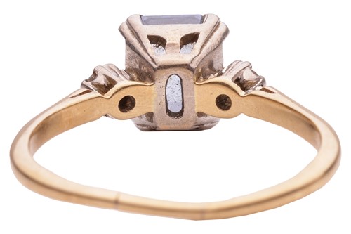 Lot 119 - A sapphire and diamond-set three-stone ring,...