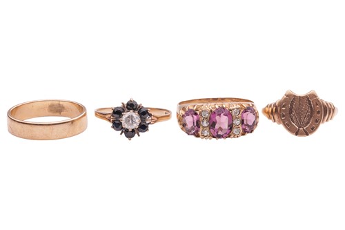 Lot 47 - A collection of rings; comprising a band ring...
