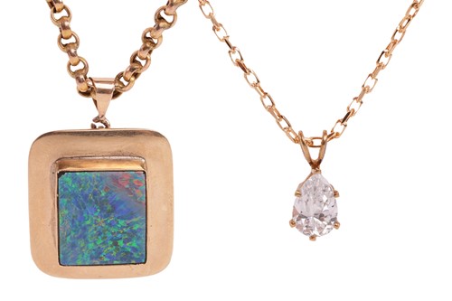 Lot 104 - Two pendants on chain, including; a pendant...