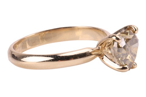 Lot 158 - A fancy-coloured diamond single-stone ring,...