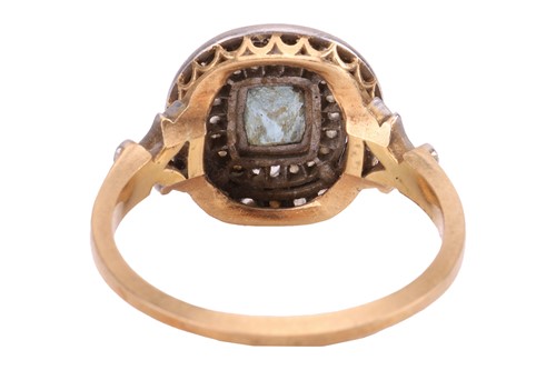 Lot 97 - An aquamarine and diamond cluster ring,...