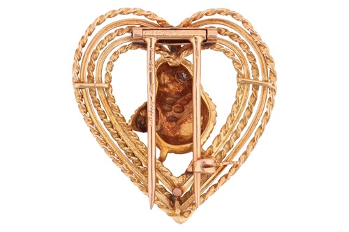 Lot 20 - A diamond-set bird brooch, the textured bird...