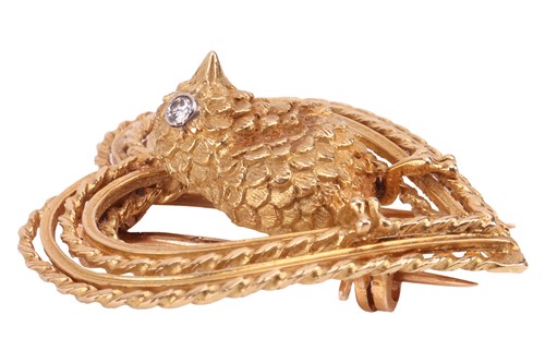 Lot 20 - A diamond-set bird brooch, the textured bird...