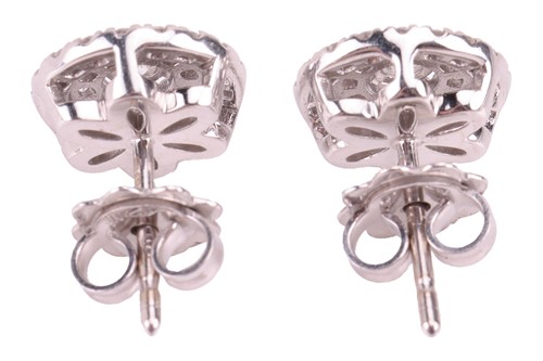 Lot 66 - A pair of diamond cluster earrings in 18ct...