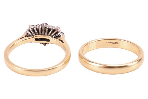 Lot 25 - An 18ct diamond cluster ring and wedding band;...