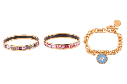 Lot 61 - Two Hermes bangles and a Mulberry bracelet;...