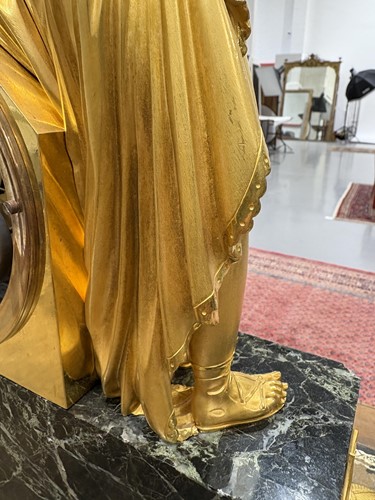 Lot 123 - A large French Empire gilt bronze and marble...