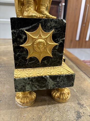 Lot 123 - A large French Empire gilt bronze and marble...