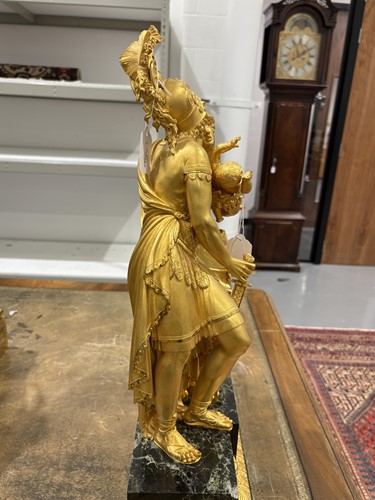 Lot 123 - A large French Empire gilt bronze and marble...