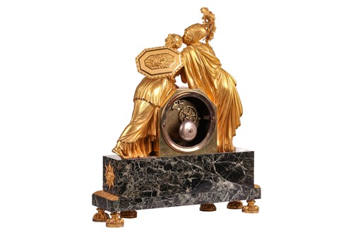 Lot 123 - A large French Empire gilt bronze and marble...
