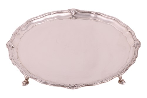 Lot 173 - A silver salver by Adie Brothers, Birmingham...