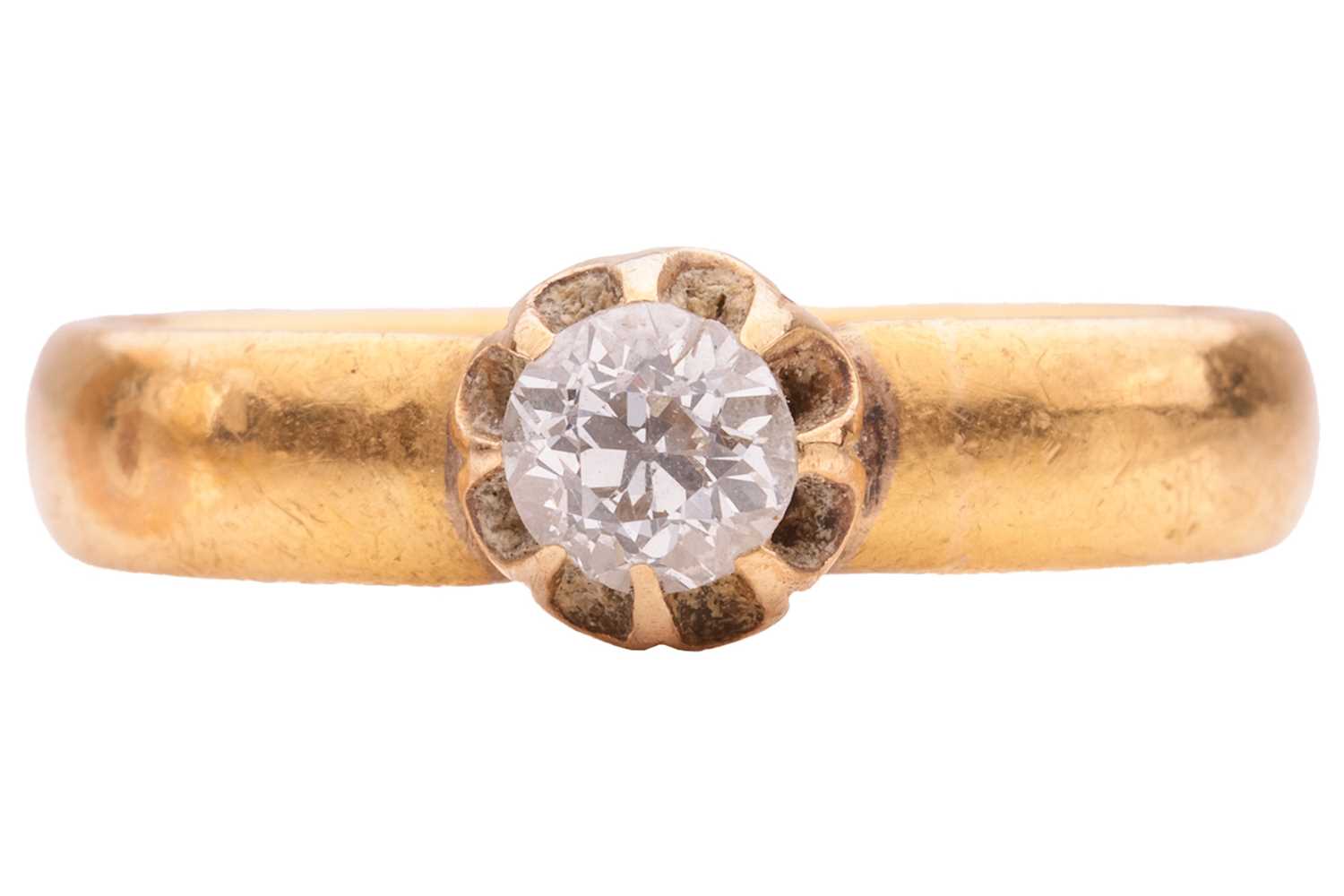 Lot 162 - A diamond single-stone ring in 22ct yellow...