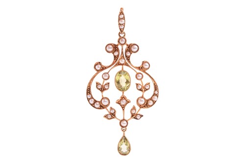 Lot 142 - Two Edwardian gem-set pendants; to include a...