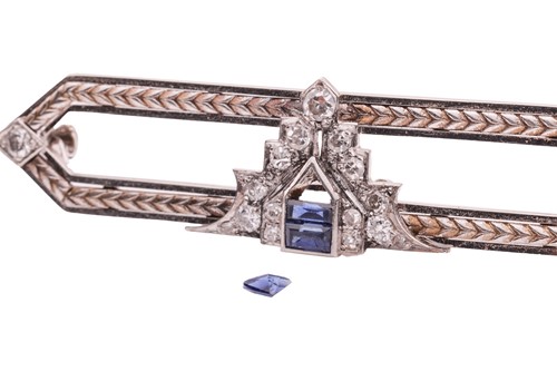 Lot 134 - An Art Deco synthetic sapphire and diamond bar...