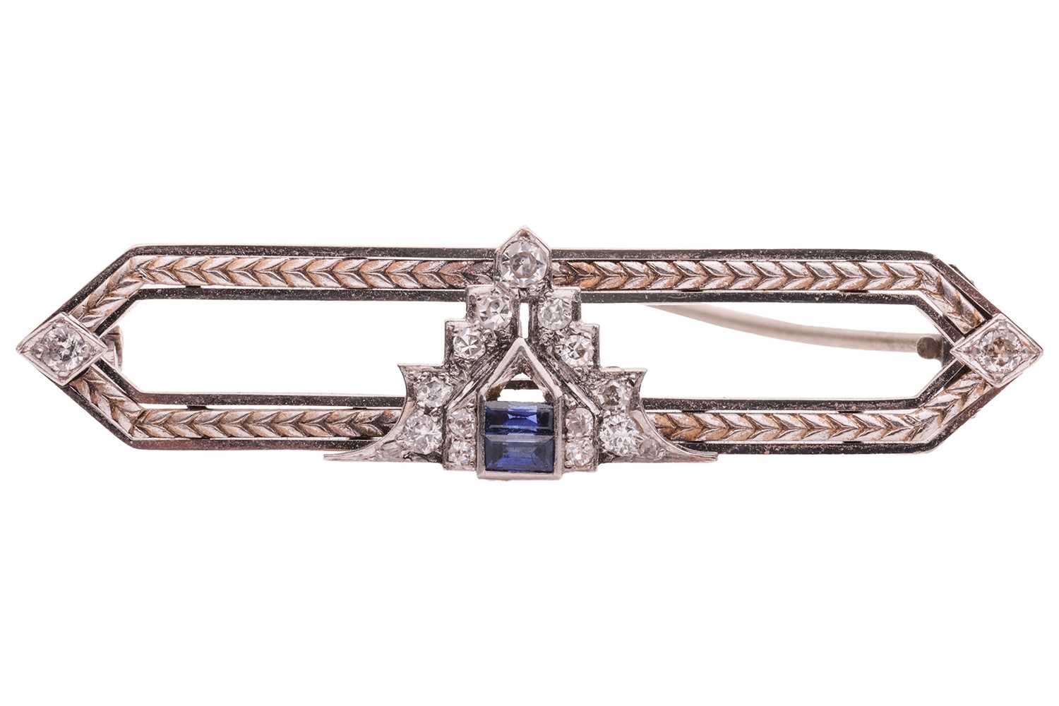 Lot 134 - An Art Deco synthetic sapphire and diamond bar...