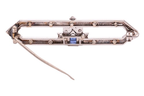 Lot 134 - An Art Deco synthetic sapphire and diamond bar...