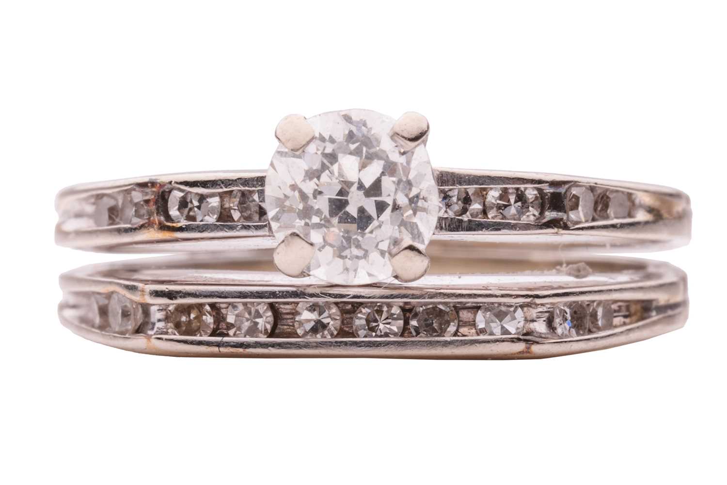 Lot 181 - A diamond-set ring, composed of a split shank...