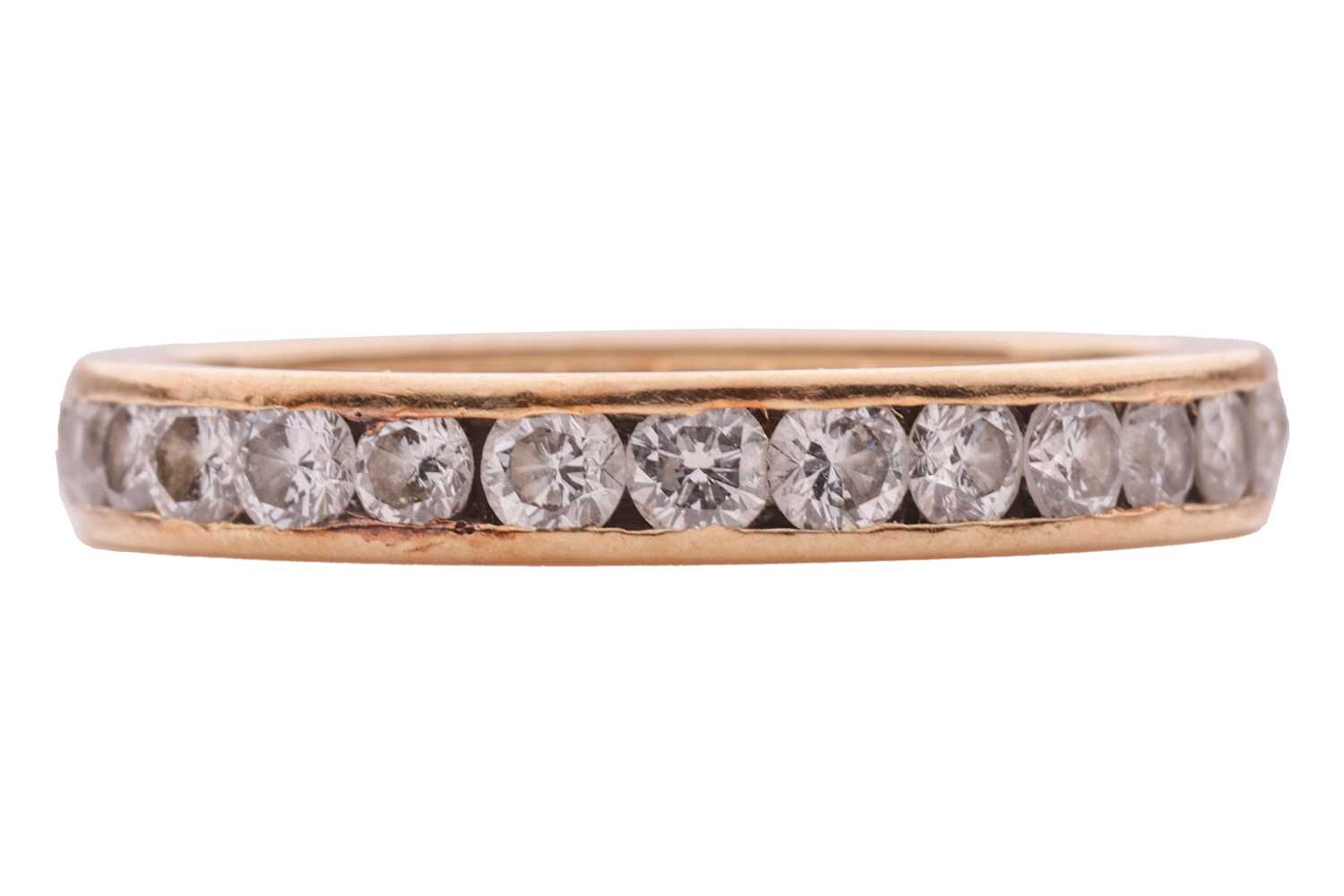 Lot 32 - A diamond-set full eternity ring, comprised of...