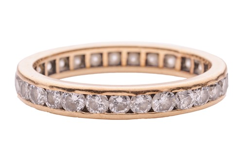 Lot 32 - A diamond-set full eternity ring, comprised of...